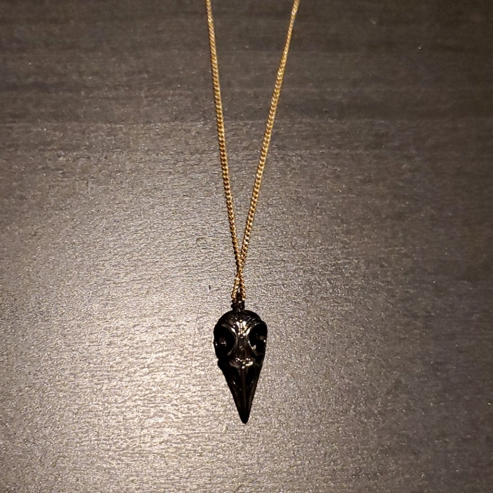 Gold Necklace with Black Pendant